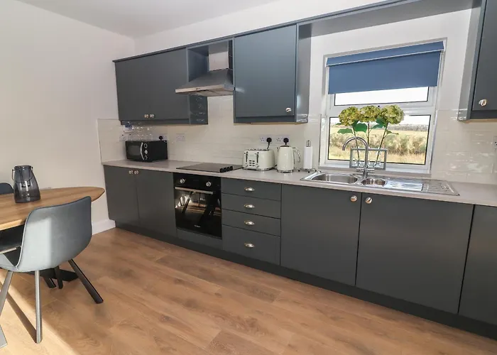 Hébergement de vacances The Boathouse *